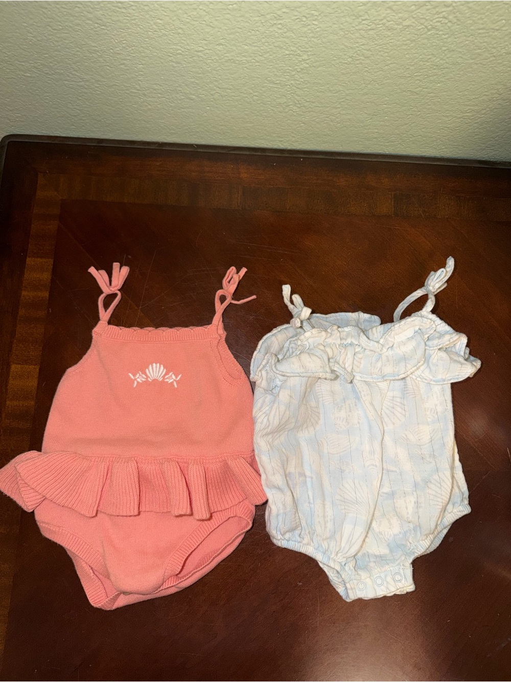 Bundle of baby girl rompers